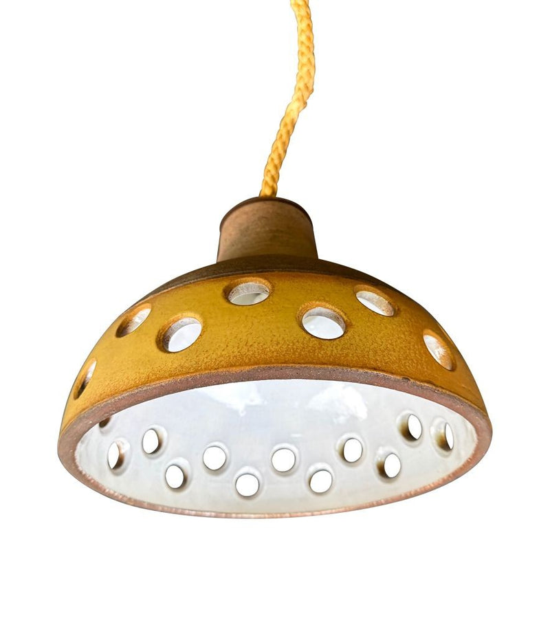 A set of three 1960s French glazed ceramic ceiling lights suspended from thick knotted rope