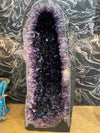 A stunning, large, high quality amethyst crystal geode cave cathedral in deep purple colour - Ed Butcher Antiques Shop London