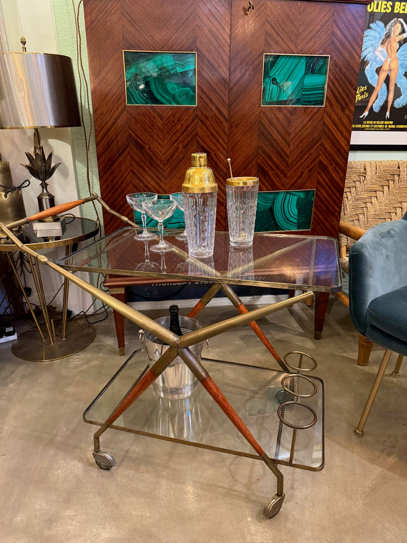An Italian 1950s brass and lacquered wood bar trolley by Cesare Lacca