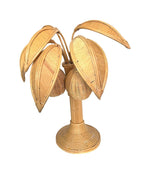 A bamboo palm tree table lamp in the style of Mario Lopez Torres with two lights