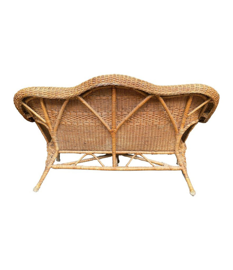 Curvaceous vintage wicker sofa French 1960s with beaded detail