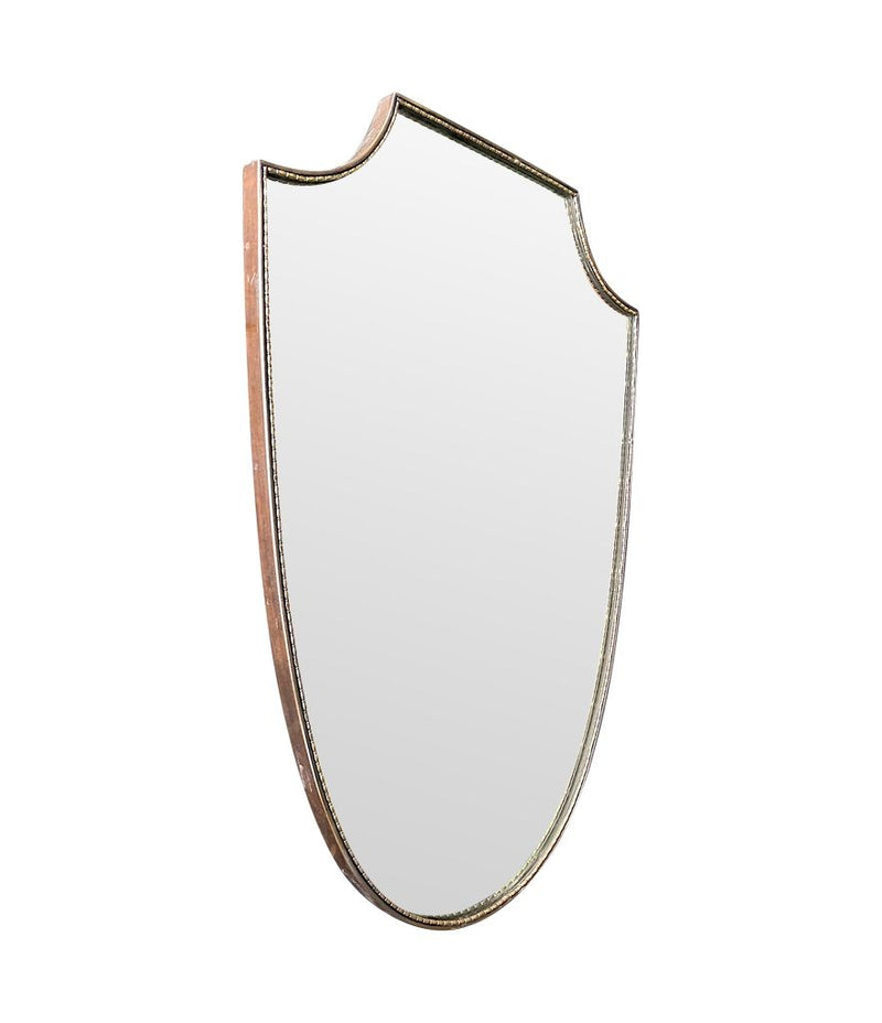 An orignal Italian 1960s brass shield mirror with beaded inner frame detail