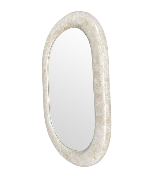 A 1970s oval mirror by Maitland Smith with tessellated marble frame.