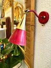 A pair of Holm Sorensen 1950s red enamelled metal and brass adjustable wall lights