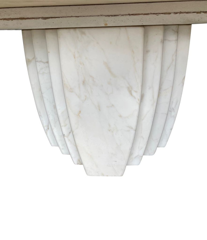 An Italian 1970s oval Carrara marble coffee table in the style of Angelo Mangiarotti