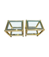 A pair of French 1970s gilt metal side tables by Pierre Vandel with original part mirrored glass shelves