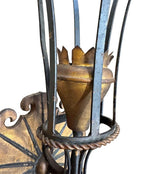 A large pair of Italian 1940s torchiere gilt and black metal wall sconces