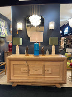 Mid Century table lamps with Travertine bases and brass fittings with blue linen shades