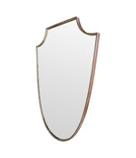 An orignal Italian 1960s brass shield mirror with beaded inner frame detail