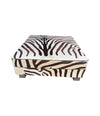 cowhide covered ottoman or coffee table with printed zebra skin design - Ed Butcher Antiques Shop London