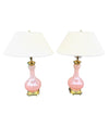 A large pair of Paul Hanson 1950s lamps with pink Murano opaline glass bases, mounted on sold brass bases
