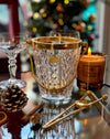 A 1960s Val Saint Lambert crystal and gold plated ice bucket with ice grabbers