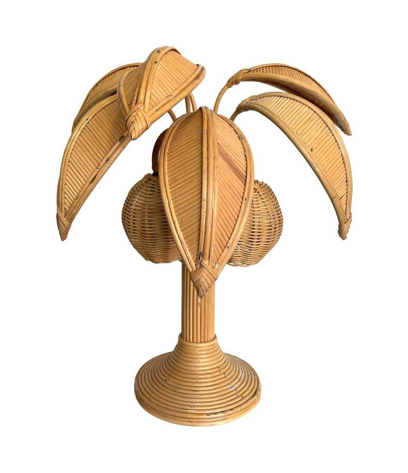 A bamboo palm tree table lamp in the style of Mario Lopez Torres with two lights