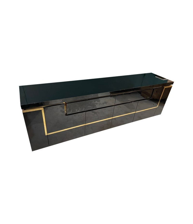A 1970s vintage black piano lacquer sideboard by Jean Claude Mahey for Roche Bobois with brass detail