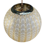 A 1960s Murano glass pendant light attributed to Venini with yellow and white swirl patten