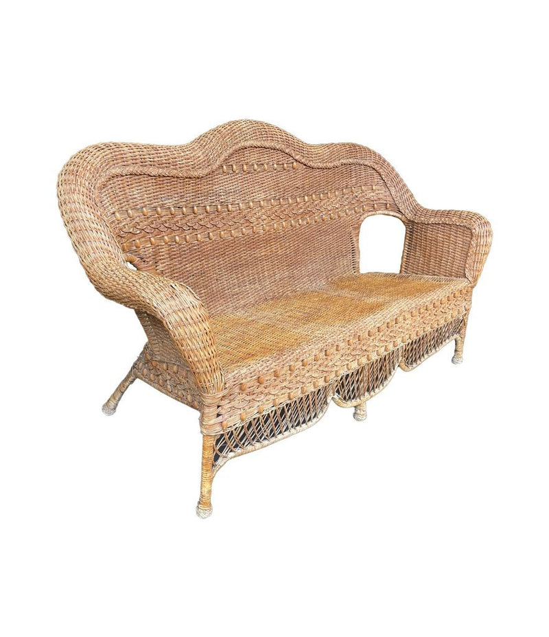 Curvaceous vintage wicker sofa French 1960s with beaded detail