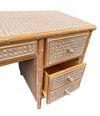 A 1980s colonial style carved wood and rattan desk by Roche Bobois