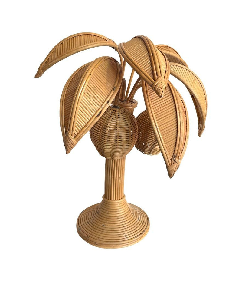 A bamboo palm tree table lamp in the style of Mario Lopez Torres with two lights