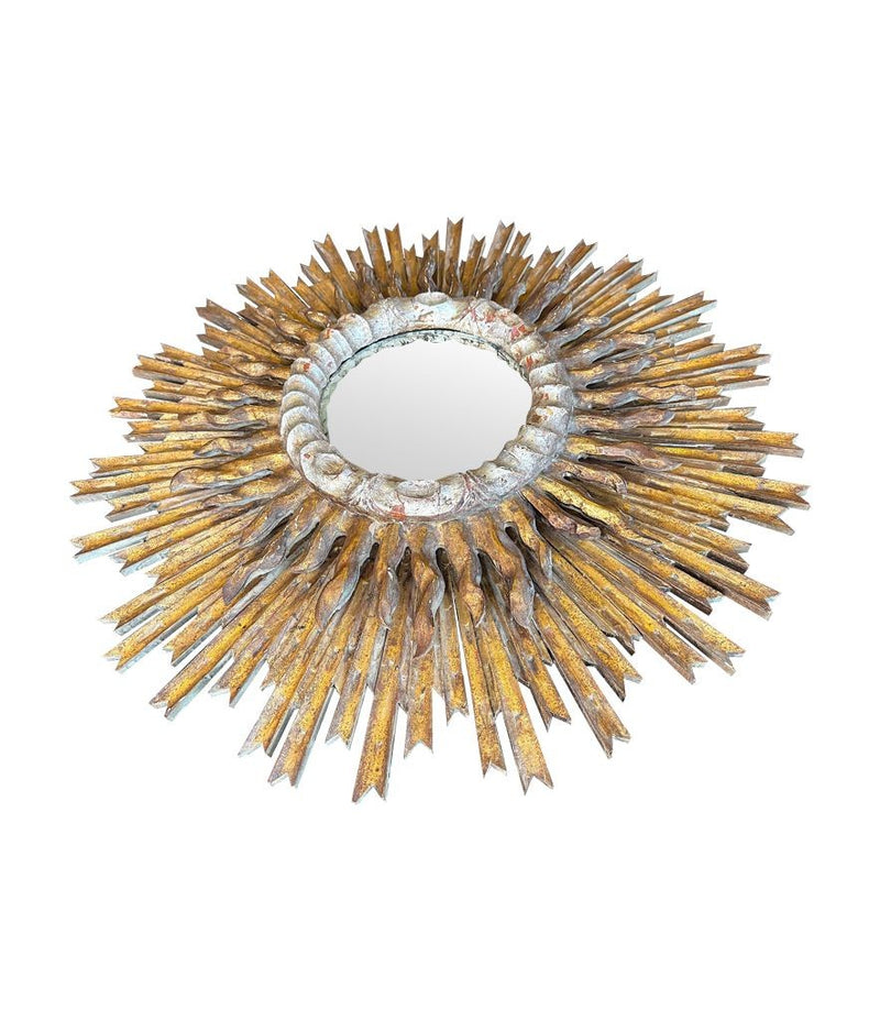 A large 1940s French carved wood gilt sunburst mirror