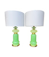 A pair of 1960s Murano glass green opaline lamps with brass base and fittings