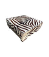 cowhide covered ottoman or coffee table with printed zebra skin design - Ed Butcher Antiques Shop London