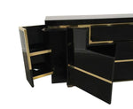 A 1970s vintage black piano lacquer sideboard by Jean Claude Mahey for Roche Bobois with brass detail