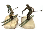 large pair of 1960s bronze cast male & female skiers by Curtis Jere mounted on onyx angled slabs - 1960s