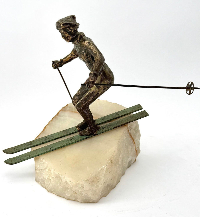 large pair of 1960s bronze cast male & female skiers by Curtis Jere mounted on onyx angled slabs - 1960s