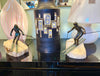 large pair of 1960s bronze cast male & female skiers by Curtis Jere mounted on onyx angled slabs - 1960s