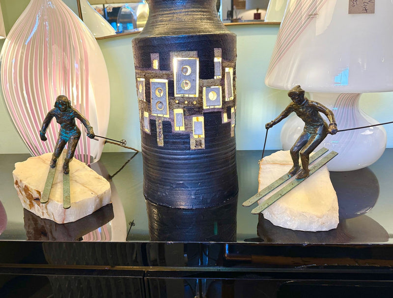 large pair of 1960s bronze cast male & female skiers by Curtis Jere mounted on onyx angled slabs - 1960s