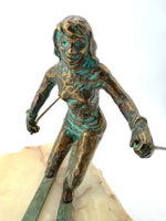 large pair of 1960s bronze cast male & female skiers by Curtis Jere mounted on onyx angled slabs - 1960s