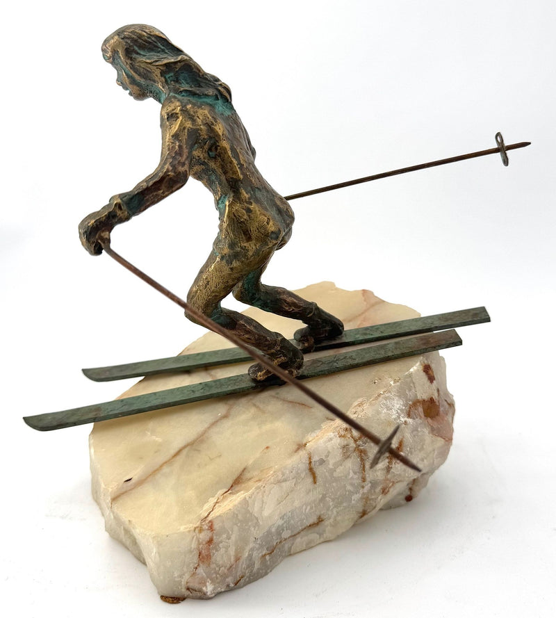 large pair of 1960s bronze cast male & female skiers by Curtis Jere mounted on onyx angled slabs - 1960s