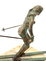 large pair of 1960s bronze cast male & female skiers by Curtis Jere mounted on onyx angled slabs - 1960s
