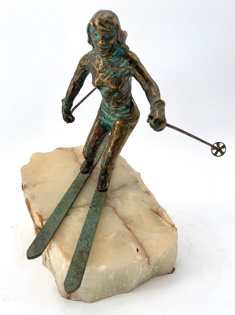 large pair of 1960s bronze cast male & female skiers by Curtis Jere mounted on onyx angled slabs - 1960s