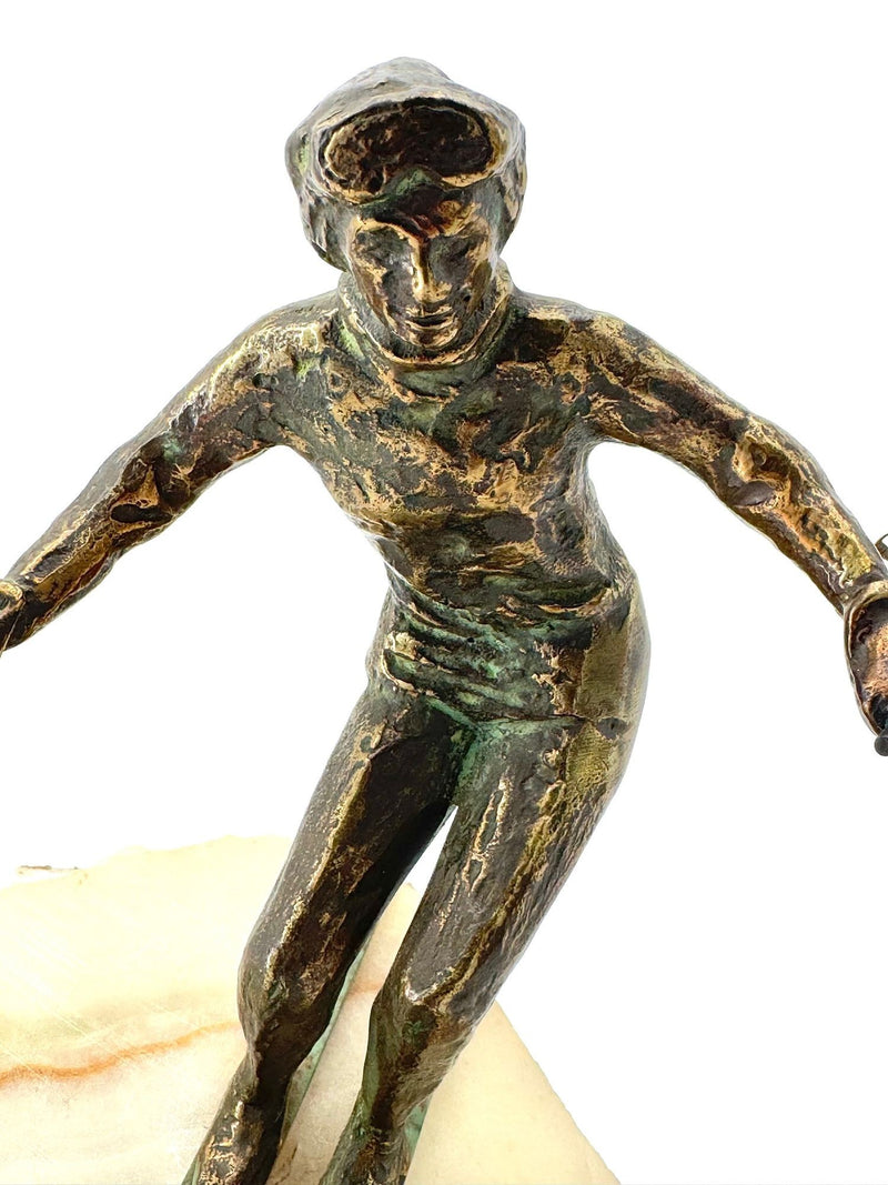 large pair of 1960s bronze cast male & female skiers by Curtis Jere mounted on onyx angled slabs - 1960s