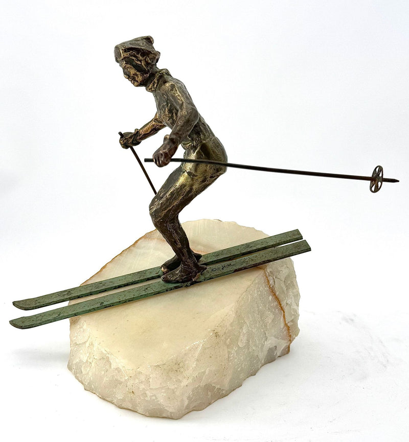 large pair of 1960s bronze cast male & female skiers by Curtis Jere mounted on onyx angled slabs - 1960s