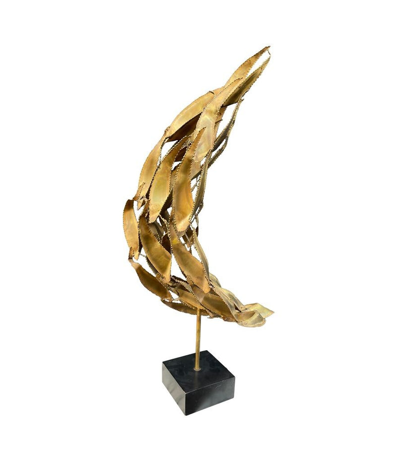 A large mid century brass torch cut, abstract sculpture attributed to Curtis Jere