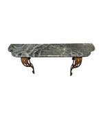 An Art Deco wrought iron gilded console table with green marble top in the style of Gilbert Poillerat