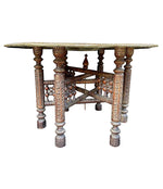 1920S MOROCCAN CARVED WOODEN FOLDING TABLE WITH BEAUTIFUL HAMMERED BRASS TOP
