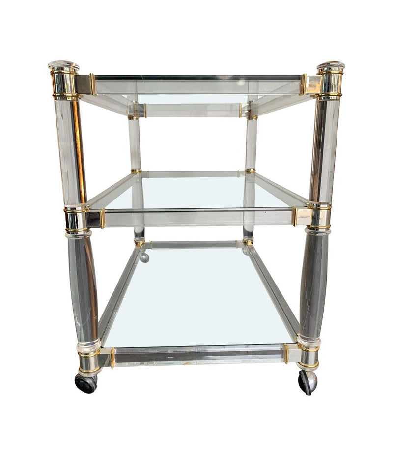 1970S LUCITE AND BRASS BAR TROLLEY WITH 3 GLASS SHELVES AND ORIGINAL CASTORS