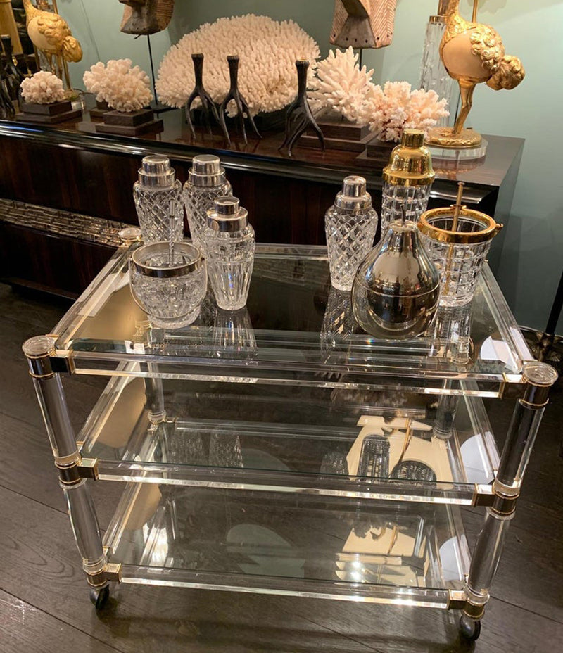 1970S LUCITE AND BRASS BAR TROLLEY WITH 3 GLASS SHELVES AND ORIGINAL CASTORS