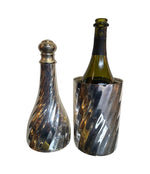 A LARGE 1950S SILVER PLATED CHAMPAGNE BOTTLE COOLER IN THE SHAPE OF A CHAMPAGNE BOTTLE
