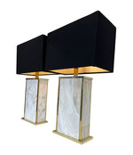 A pair of Italian 1970s Carrera Marble table lamps with gilt metal trim and new bespoke black and gold shades