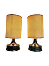 A pair of Swedish Orrefors blue glass lamps by Carl Fagerlund with brass collar