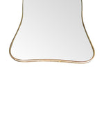 A large original 1950s Italian curved brass framed mirror with original plate