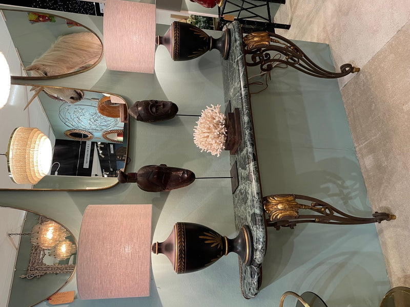 An Art Deco wrought iron gilded console table with green marble top in the style of Gilbert Poillerat