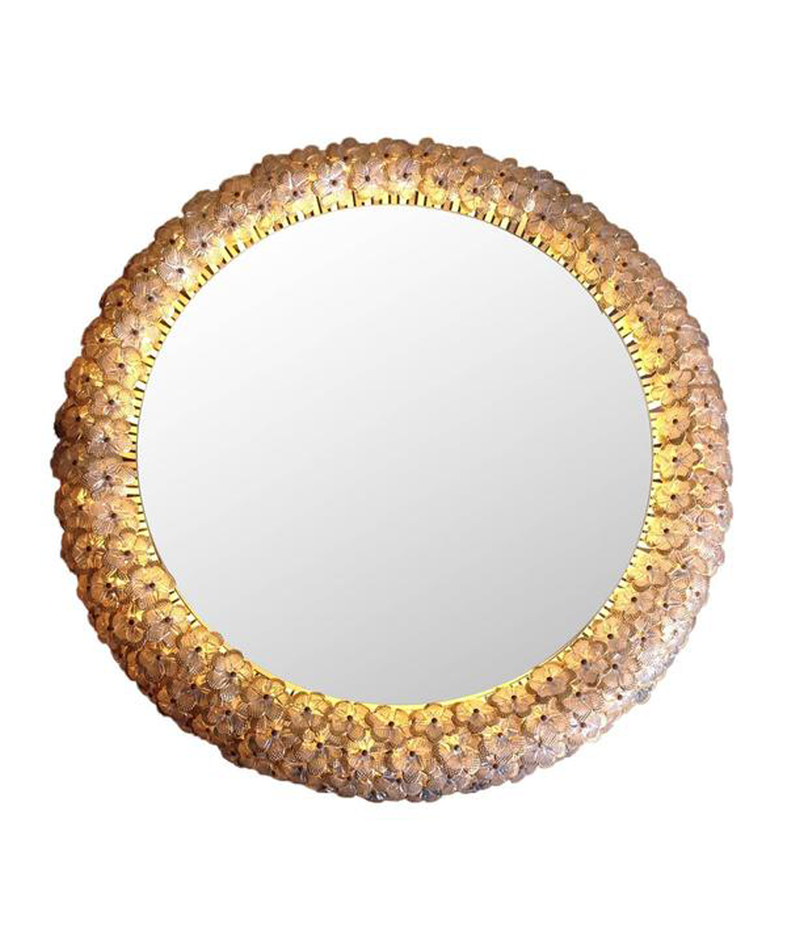 A BEAUTIFUL EMIL STEJNAR BACK LIT MIRROR WITH GLASS FLOWERS SURROUND