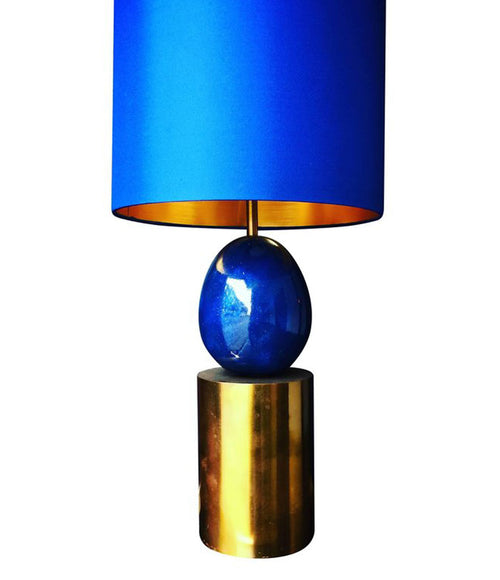 A MAISON CHARLES BRASS AND BLUE EGG LAMP