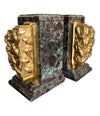 A PAIR OF ART DECO BOOKENDS OF AMAZONITE MARBLE AND CAST GILT METAL BEES