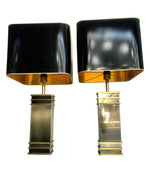 A PAIR OF ART DECO STYLE BRASS LAMPS WITH ORIGINAL SHADES